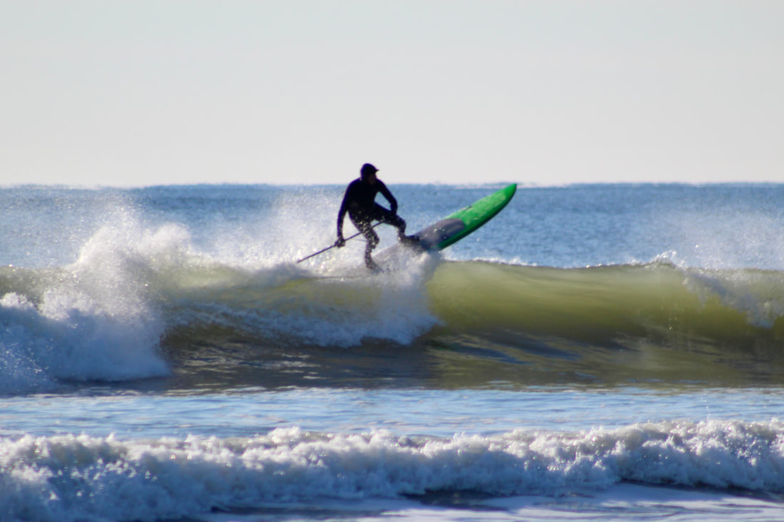 Picture:  Primal Surf owner, Michael Laielli, testing out the Sunova Creek 9'1